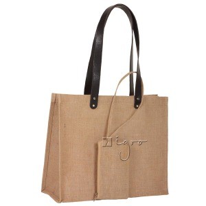 Jute carry bag with long leather handles and theft protected purse